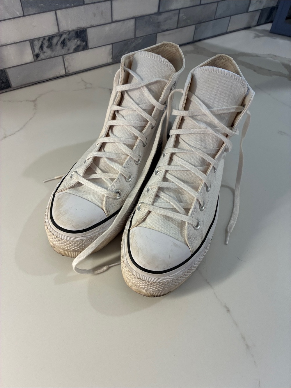 Converse High Top Canvas Sneakers in Off-White with Black Trim